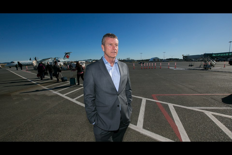 Victoria International Airport CEO Geoff Dickson on the tarmac. A $19.4 million expansion of the lower passenger departure lounge will reduce the distance people have to walk on the tarmac.