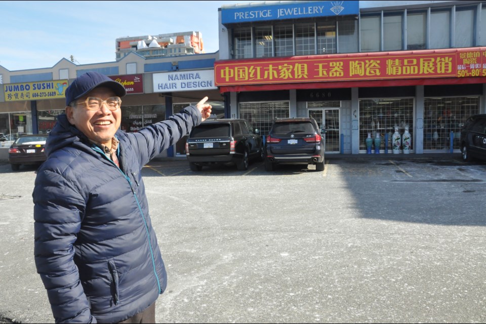 Richmond resident Fanrong Kong was walking by this ceramics shop on No. 3 Road when the Richmond News was conducting a street poll on Chinese-only signage. Kong said a bylaw should be in place to ensure English is a common language on business signs. Photo by Daisy Xiong Feb. 20, 2018.