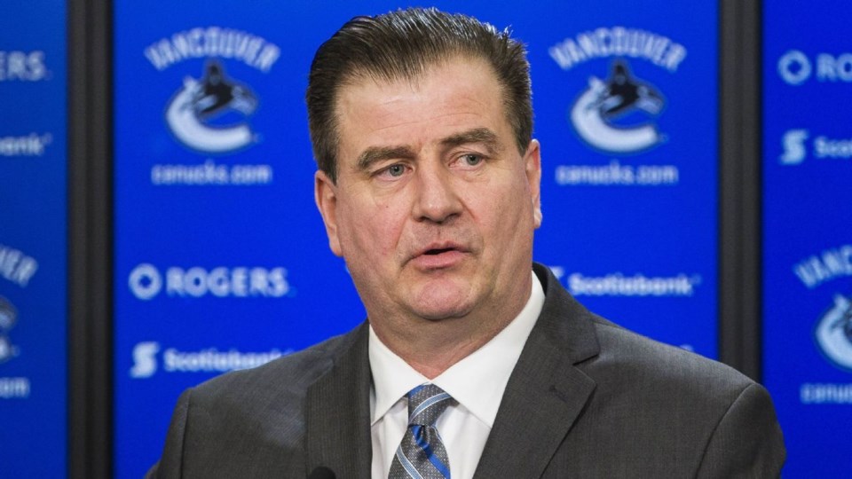 Jim Benning speaks at a press conference