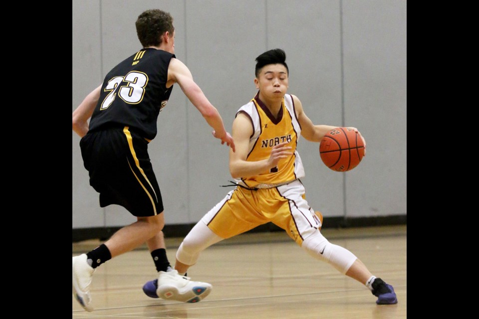 Burnaby North's Anthony Mah makes his move up court during tournament play earlier in the season. The Vikings square off against David Thompson tonight (8 p.m.) in a must-win match at the 4-A Lower Mainland championships in Richmond.