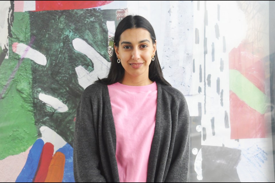 Richmond artist Russna Kaur uses different lines and shapes in bright colours to showcase the energy and feeling of crowds, movement and chaos in the process of migration. Daisy Xiong photo