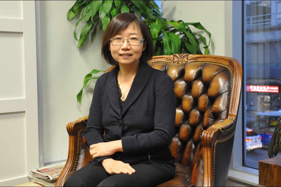 Hong Guo, founder and director of Richmond-based Guo Law Corporation, said she is considering running for mayor of Richmond in the upcoming election, despite that she is under investigation regarding the $7.5 million, which she claims to be stolen from her company’s trust fund. Daisy Xiong photo