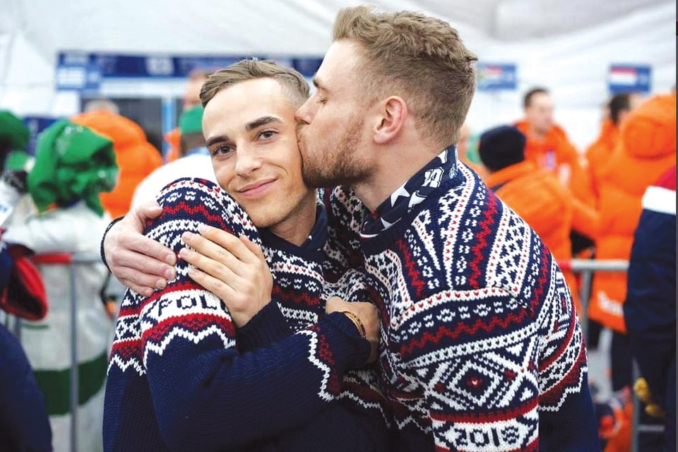 Adam Rippon (left) and Gus Kenworthy show some LGBTQ pride at the 2018 Winter Olympics. Rippon is the first openly gay man from the U.S. to win a Winter Olympic medal.