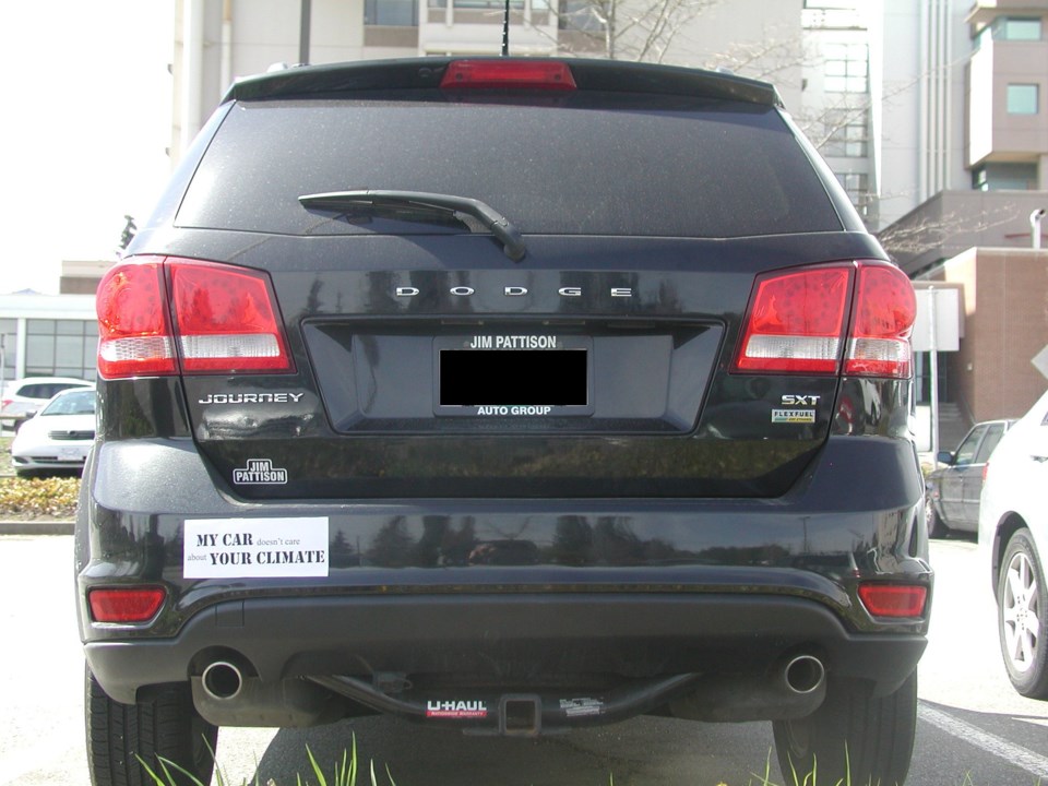 Members of the climate change advocacy group CO2alitionBC have been tagging vehicles and street sign