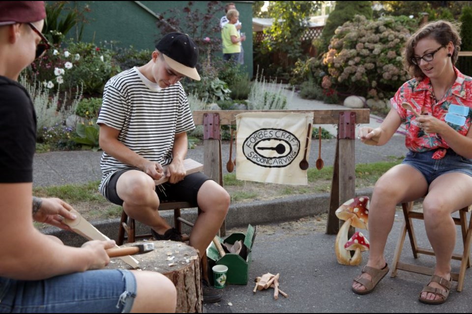 A group organized a spoon-carving workshop at the Hearth Carnival in East Vancouver. Photo Courtesy of Vancouver Foundation