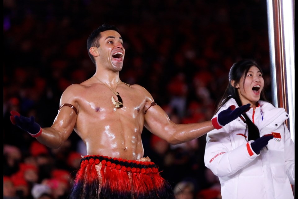 Tonga's Pita Taufatofua reacts during the closing ceremony of the 2018 Winter Olympics in Pyeongchang, South Korea, Sunday, Feb. 25, 2018.