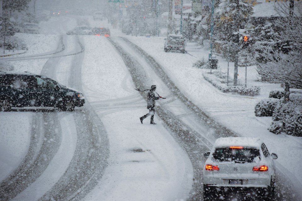 Snow shovels were required equipment in downtown Sechelt Feb. 23