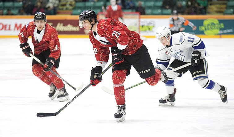 Prince George Cougars forward Vladislav Mikhalchuk prepares to shoot the puck against the Victoria Royals on Saturday night at CN Centre. The Cougars were wearing special Don Cherry themed jerseys that will be auctioned off to raise money for the Canadian Kidney Foundation. Citizen Photo by James Doyle