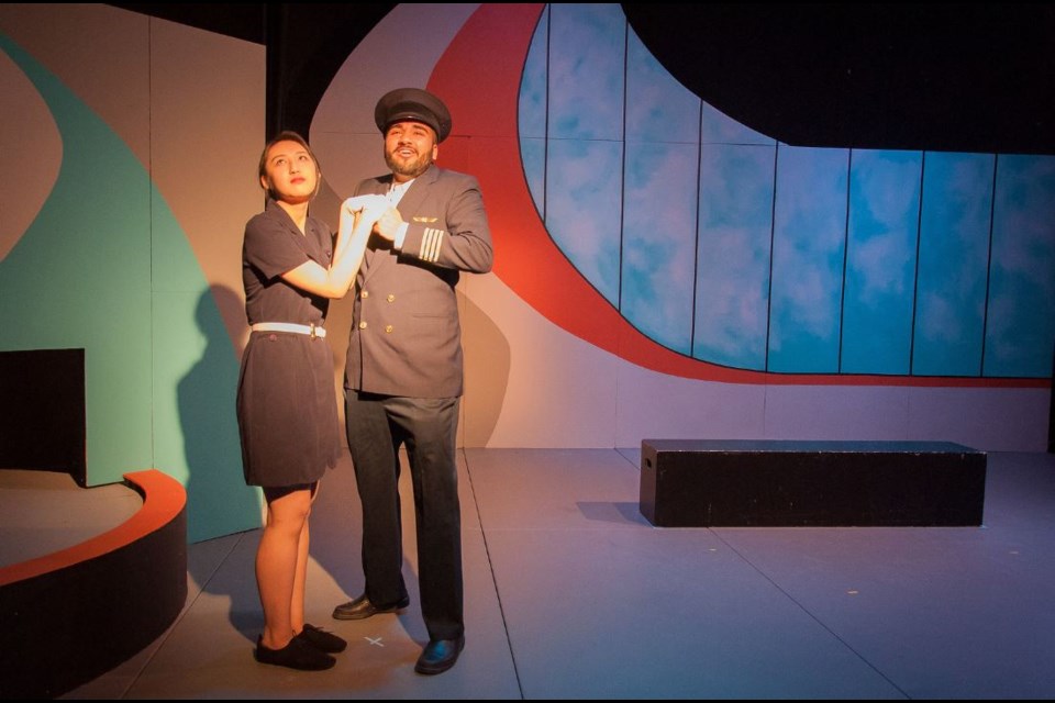 Departures and Arrivals by Cambie secondary theatre. Photo by Greg Michalowski