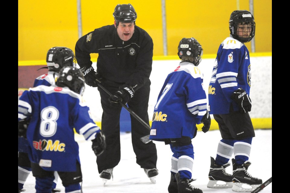 Richmond Minor Hockey’s director of player development Glenn Wheeler puts players through the paces during a recent Intro to Hockey session at the Richmond Ice Centre.