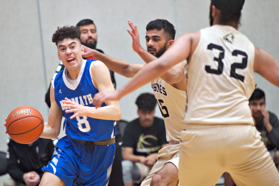 Jordin Kojima drives to the basket in his team's 78-73 quarter-final loss to North Delta on Thursday night at the B.C. 3A Championships at the Langley Events Centre.