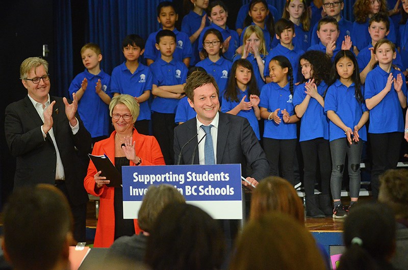 Education Minister Rob Fleming, at the podium, was all smiles Friday morning when he announced Richard McBride Elementary School would be replaced by a brand new $22.6 million school. The school is set to open January 2021.