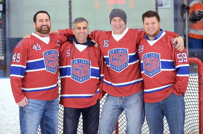 From left, team members Tom Levesque, Ken Carrusca, Jason Howell and Wes Reamsbottom reunite at 8 Rinks in Burnaby. In January, Carrusca’s life was saved by an AED after a cardiac arrest during a hockey game at the rink.