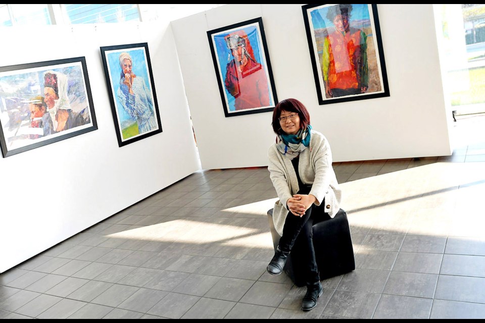 Toni Zhang McAfee, deputy director of Lipont Place, said the gallery helps launch emerging, local artists and aims to evolve into a thriving business doing so. Photo by Boaz Joseph/Special to the News