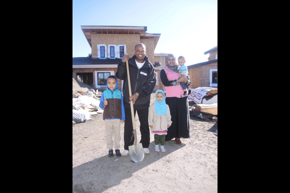 Gumatcha Taha and his family are hoping to move into their new, Habitat for Humanity home in October. Alan Campbell photo