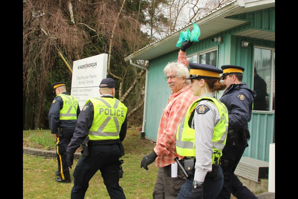 Former director of Greenpeace Rex Wyler is arrested by Burnaby RCMP after blocking the entrance to the Trans Mountain terminal in Burnaby.