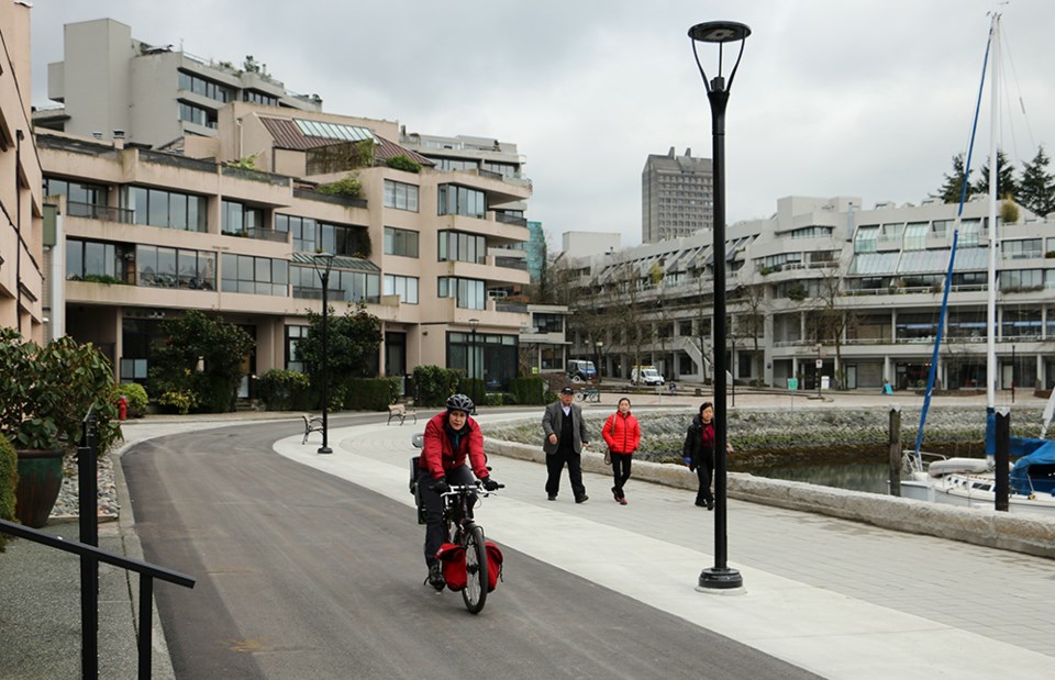 Cyclists and pedestrians are back on the Seawall along South False Creek between Stamps Landing and