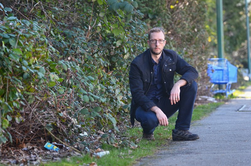 Burnaby resident Warren Mirko is fed up with garbage accumulating beside a path running between his Metrotown strata and Marlborough Elementary School.