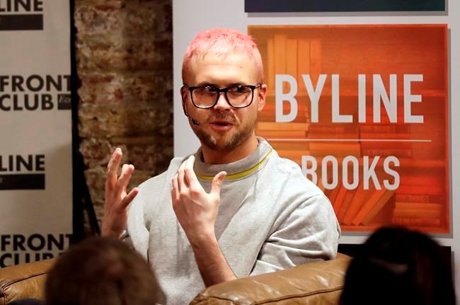 Chris Wylie, from Canada, who once worked for the UK-based political consulting firm Cambridge Analytica, gives a talk at the Frontline Club in London, Tuesday, March 20, 2018. Cambridge Analytica has been accused of improperly using information from more than 50 million Facebook accounts. It denies wrongdoing. Wylie has been quoted as saying the company used the data to build psychological profiles so voters could be targeted with ads and stories. (AP Photo/Matt Dunham)