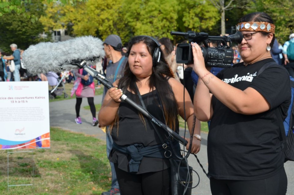 Eileen Francis and Rose Stiffarm take part in a film shoot for Love Will Set You Free.