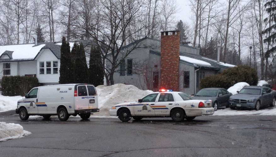 Police on the scene of a bust of two suspects in a counterfeit cash operation in College Heights