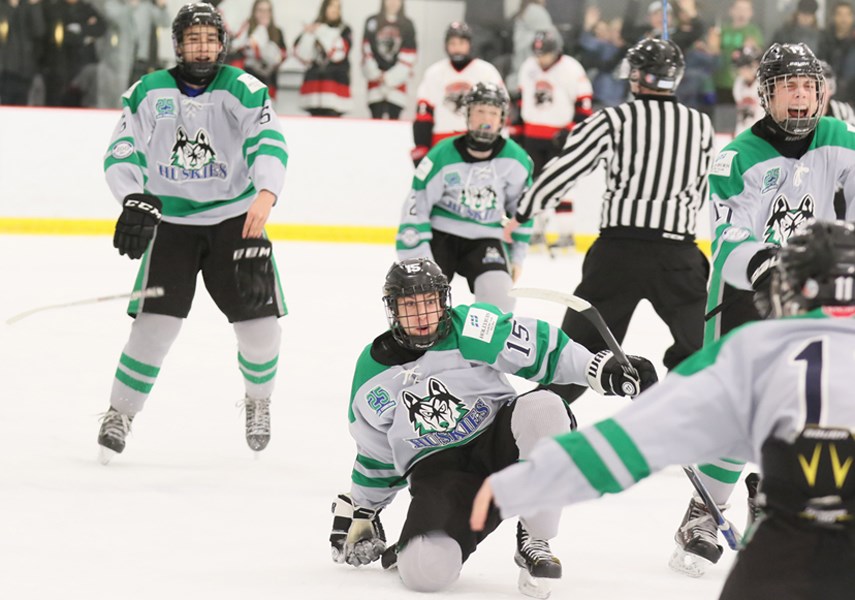 The celebration begins after the Hollyburn Huskies scored in overtime in the provincial championship final. photo supplied