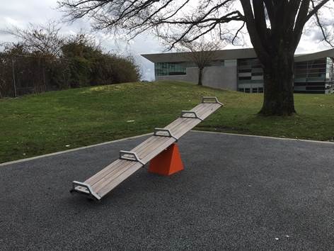 The city really wrote this: “Part bus bench, part teeter-totter, SeeSawSeat encourages people not ju