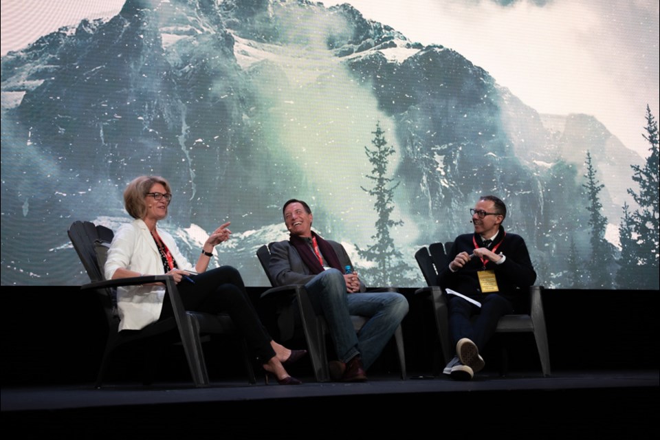 MP Pamela Goldsmith-Jones interviews Vancouver real estate marketer Bob Rennie and JJ Bean Coffee founder John Neate during a "fireside chat."