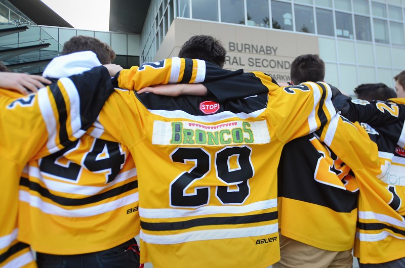 Members of a Burnaby school district hockey academy whose teams play out of the Burnaby Winter Club taped the words “Broncos” and “Humbodlt” onto the backs of their jerseys Thursday to show support for the victims of the Humboldt Broncos bus crash last Friday.