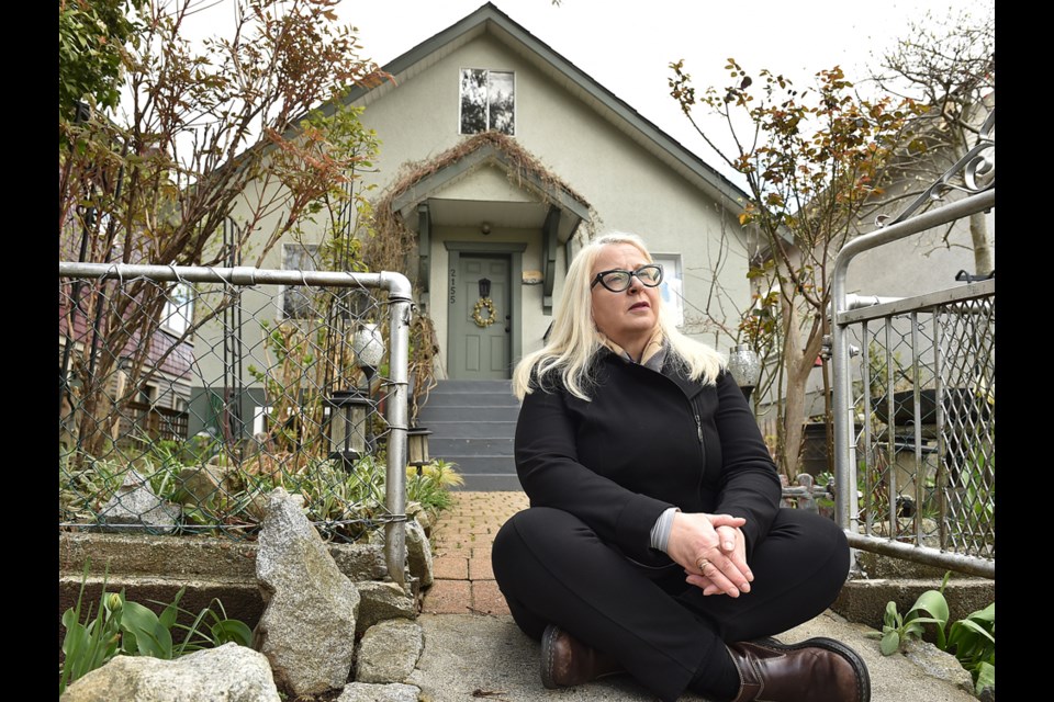 Christine Oviedo will be sad to leave the Grandview-Woodland home that's been in her family for eight decades. Photo Dan Toulgoet