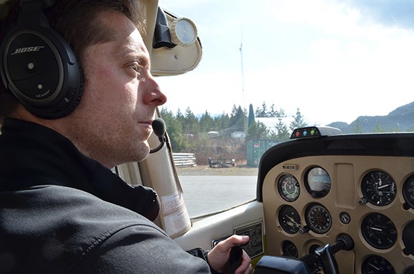 David Eastwood at the controls of the Cessna as he guides the plane for takeoff.