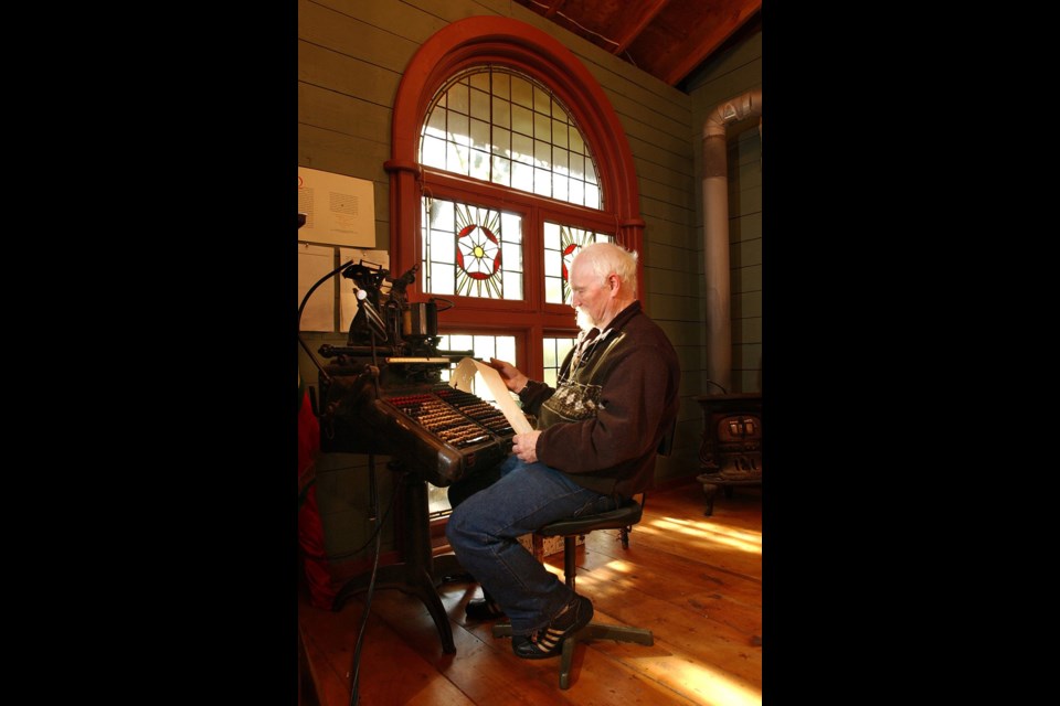 The late Jim Rimmer at work on one his vintage typesetters in the studio of his New Westminster home in 2004. Rimmer was a world-renowned typographer who salvaged and restored old printing press machinery and then used them to create fonts and print limited edition posters and books that were coveted by collectors.