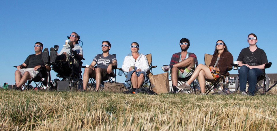 Jim Ryan family watching eclipse