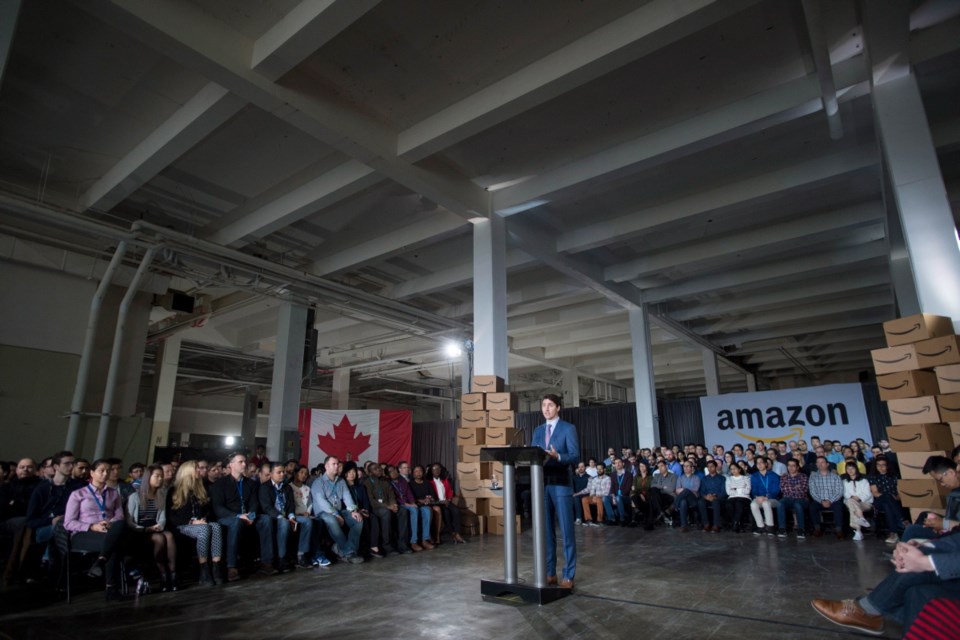 Prime Minister Justin Trudeau makes an announcement at the future offices of Amazon in downtown Vancouver, B.C., Monday, April 30, 2018. THE CANADIAN PRESS/Jonathan Hayward