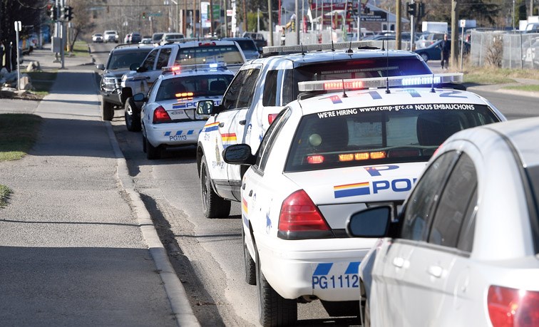 Heavy police presence on Queensway Tuesday morning after a shooting in the Queensway Court Motel. Citizen photo by Brent Braaten May 1 2018