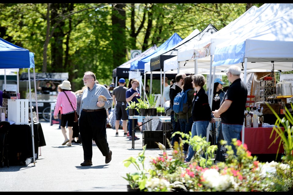 The sun shone on market vendors on May 5.