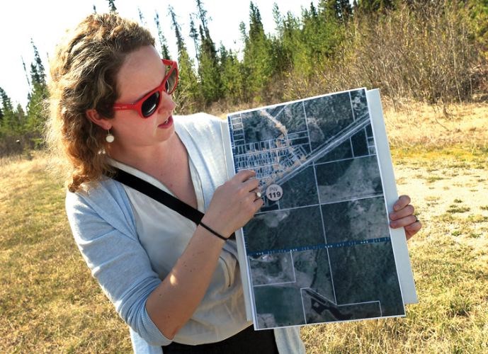 City environmental assistant Andrea Byrne explains how the Western Acres water treatment system works during a media event Tuesday.