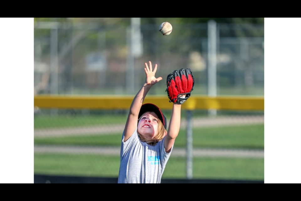 If each member of the Pink Panthers shows the type of determination exhibited by Chloe Dolha in catching this fly ball, the first all-girls team in Kamloops Minor Baseball Association history is in good hands.