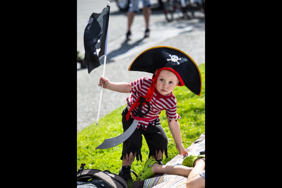Three-year-old Knox Gabel waits for the start of the Buccaneer Days parade in Esquimalt on Saturday, May 12, 2018.