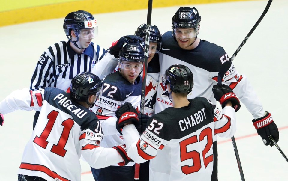 Anthony Beauvillier celebrates a goal for Canada against Latvia at 2018 World Hockey Championships.