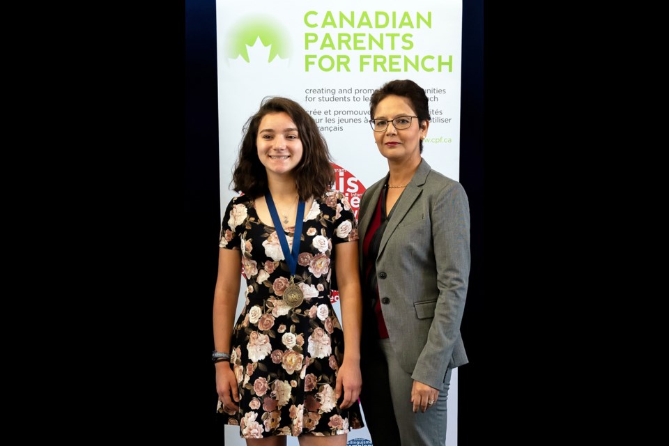 École Glenbrook Middle School’s Monika Arcadi with Padminee Chundunsing, president of the Fédération Francophone de la Colombie-Britannique at the Concours d’art oratoire provincial finals earlier this month. Arcadi won first place in the Grade 8 immersion category for her speech “Le féminisme” (feminism).