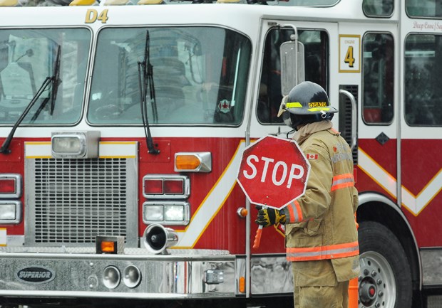 firefighter and truck