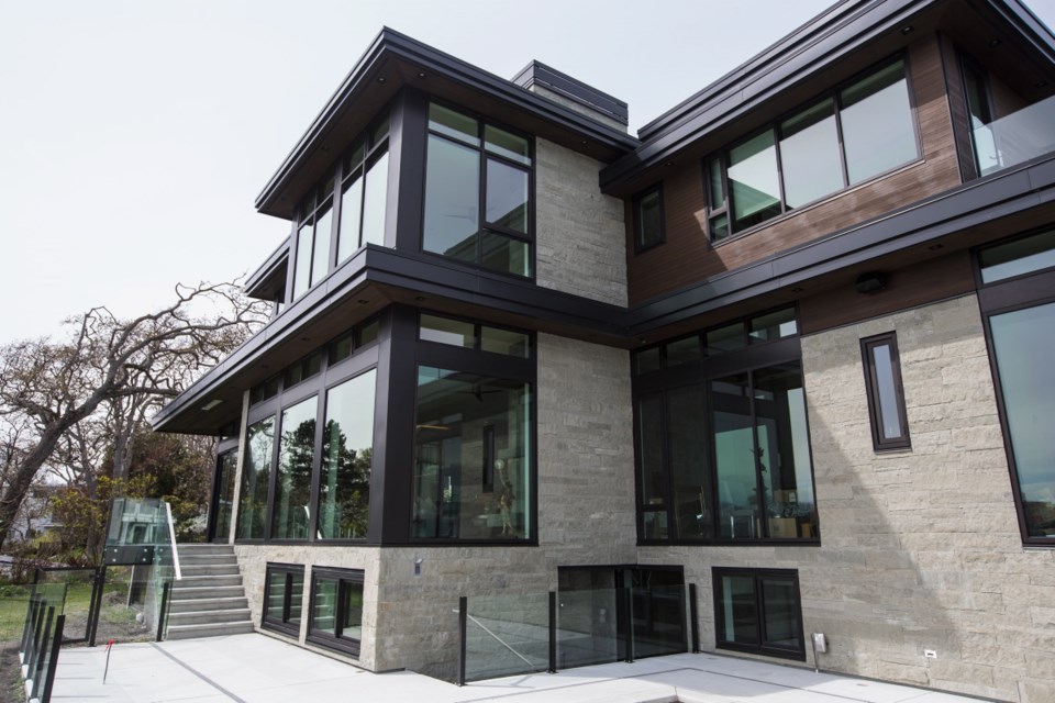 Architect Peter de Hoog designed this house of glass, cedar and stone to take full advantage of light and views. The homeowners bought the property across from Oak Bay Marina in 2014 and spent a year navigating planning hoops. It took another 2 1/2 years to build.