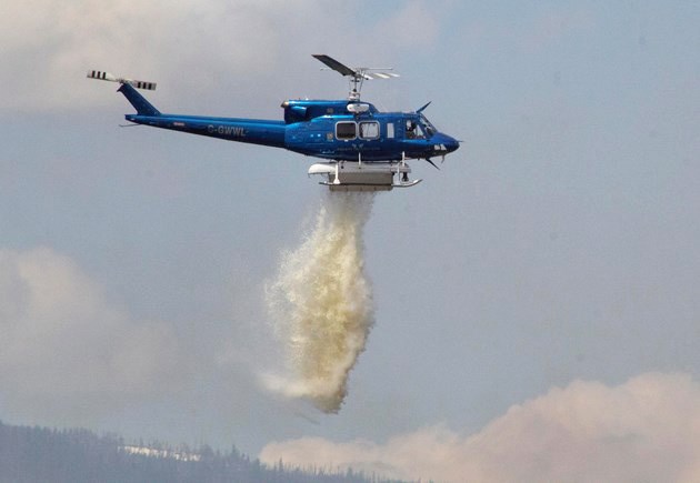 helicopter dousing fire
