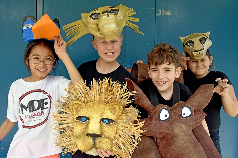 Anabelle Su plays Zazu, Jack Hoegler is Simba, Nathan Jabour portrays Pumbaa and Emilie Flaubert transforms into Nala for the Disney production of The Lion King: Kids at Irvine elementary in PoCo.