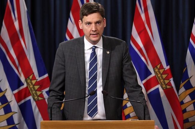 Attorney General David Eby speaks during a press conference in the press theatre at legislature.