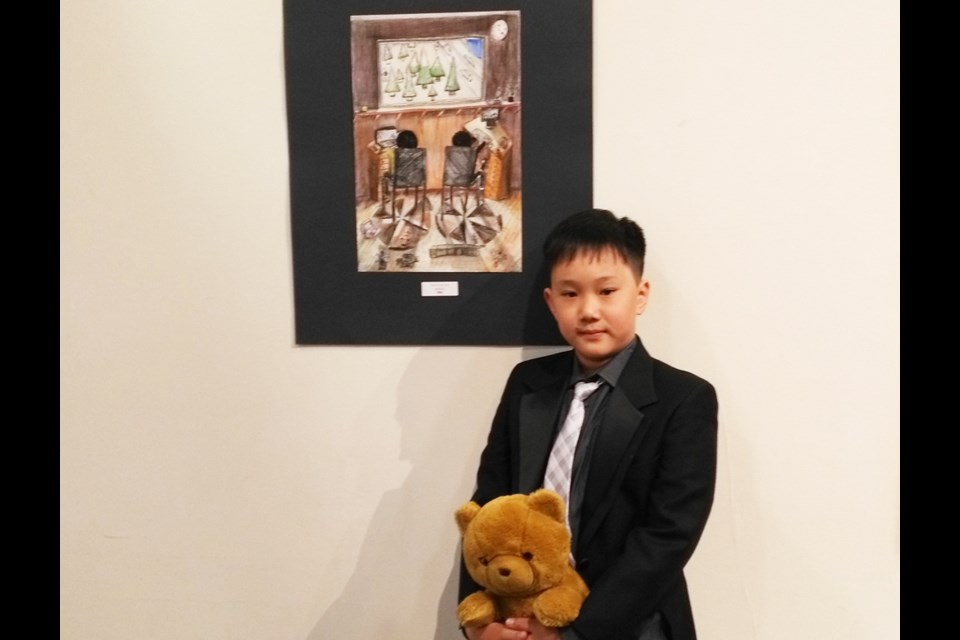 Kevin Poon is pictured in front of his work “My beloved partner.” Photo submmitted