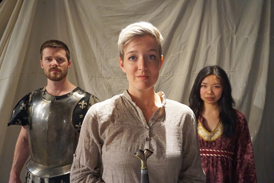 Emily Wheeler, centre, stars in Saint Joan, with Aaron Wheeler and Trisha Li.