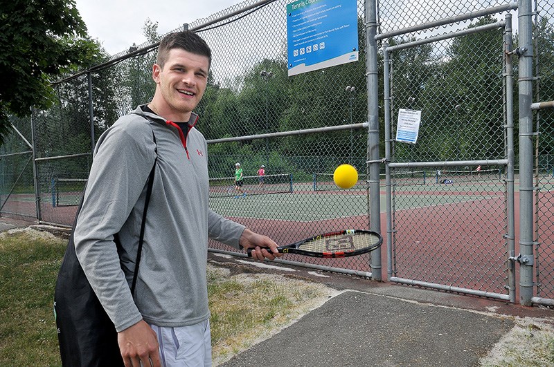 Port Moody's James Bettauer, a professional hockey player in Germany, has invented a unique solution to busy, overbooked tennis courts by carrying everything he needs to set up a match in a nylon sling bag. He's launching his Backpack Tennis game on the crowdfunding website kickstarter.com today.