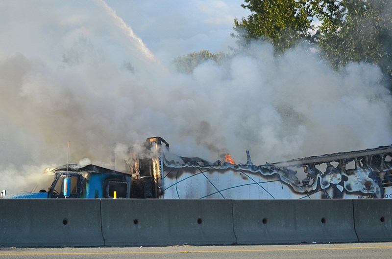 A transport truck carrying chicken and cheese caught fire on Highway 1 early Thursday evening. It took Coquitlam firefighters approximately to completely douse the blaze.